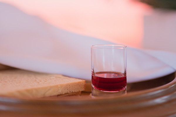 Bread and glass of wine for Communion.